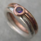 Amethyst Engagement ring with red gold wedding ring