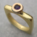 Contemporary amethyst and gold square ring