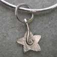 front view of a star charm bangle