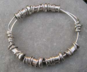 Silver Expanding bangle with handmade beading