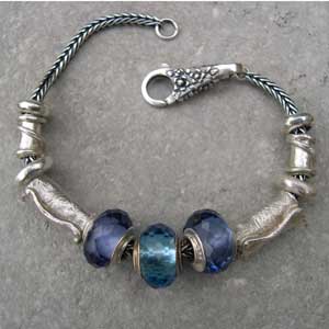 silver and blue bead bracelet