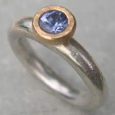designer silver engagement ring with sapphire