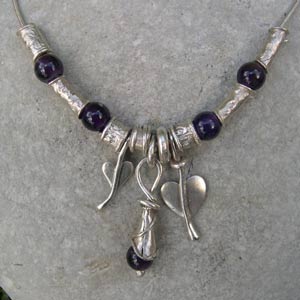 Amethyst necklace with heart charms