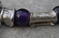 silver and amethyst beads detail