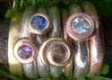 contemporary amethyst and sapphire gold and silver rings