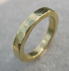 chunky  hammered 18ct yellow gold wedding ring modern design