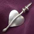 a silver heart pendant for valentines
