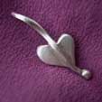 a small silver heart necklace