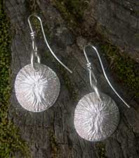 silver earring discs