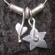 leaf and star charm necklace
