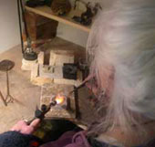 sue yeoman making rings in the workshop