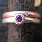 amethyst engagement ring with red gold wedding ring
