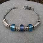 silver and  blue glass beaded bracelet
