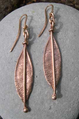 red  gold leaf design earings