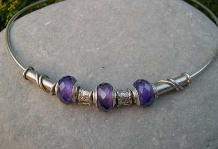 Purple beaded necklace with silver twist beads