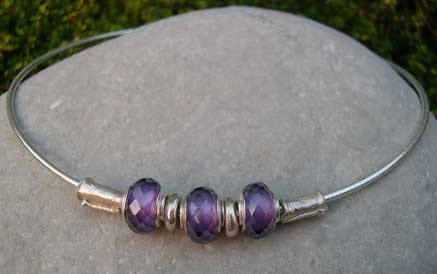 Purple beaded necklace with silver reticulated beads