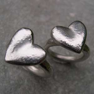 Two large hearts on silver rings
