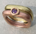 red and yellow gold rings with amethyst