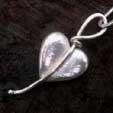 a very large and chunky silver heart pendant