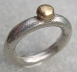 contemporary design silver ring with gold pillow