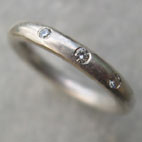 silver half eternity ring