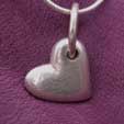 a chunky silver heart on a silver chain