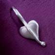 a small silver heart pendant