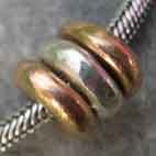 one silver spacer and two gold spacer beads
