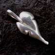 one of a pair of chunky silver leaf pendants